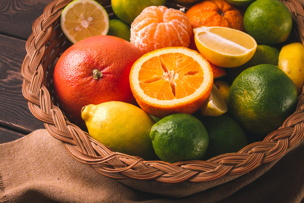 Assortment, citrus fruits, in a basket, close-up, top view, no people,